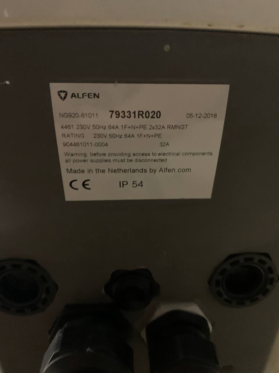 Alfen charge point rating plate showing a factory date of 05-12-2018, 230V 64A single phase feeding two 32A sockets, IP54