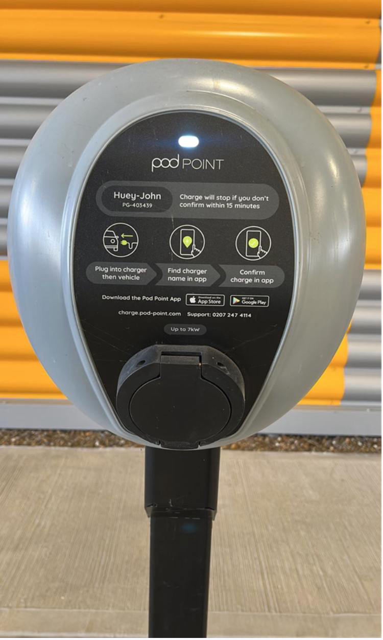 Pod Point pedestal charge point with its status light showing