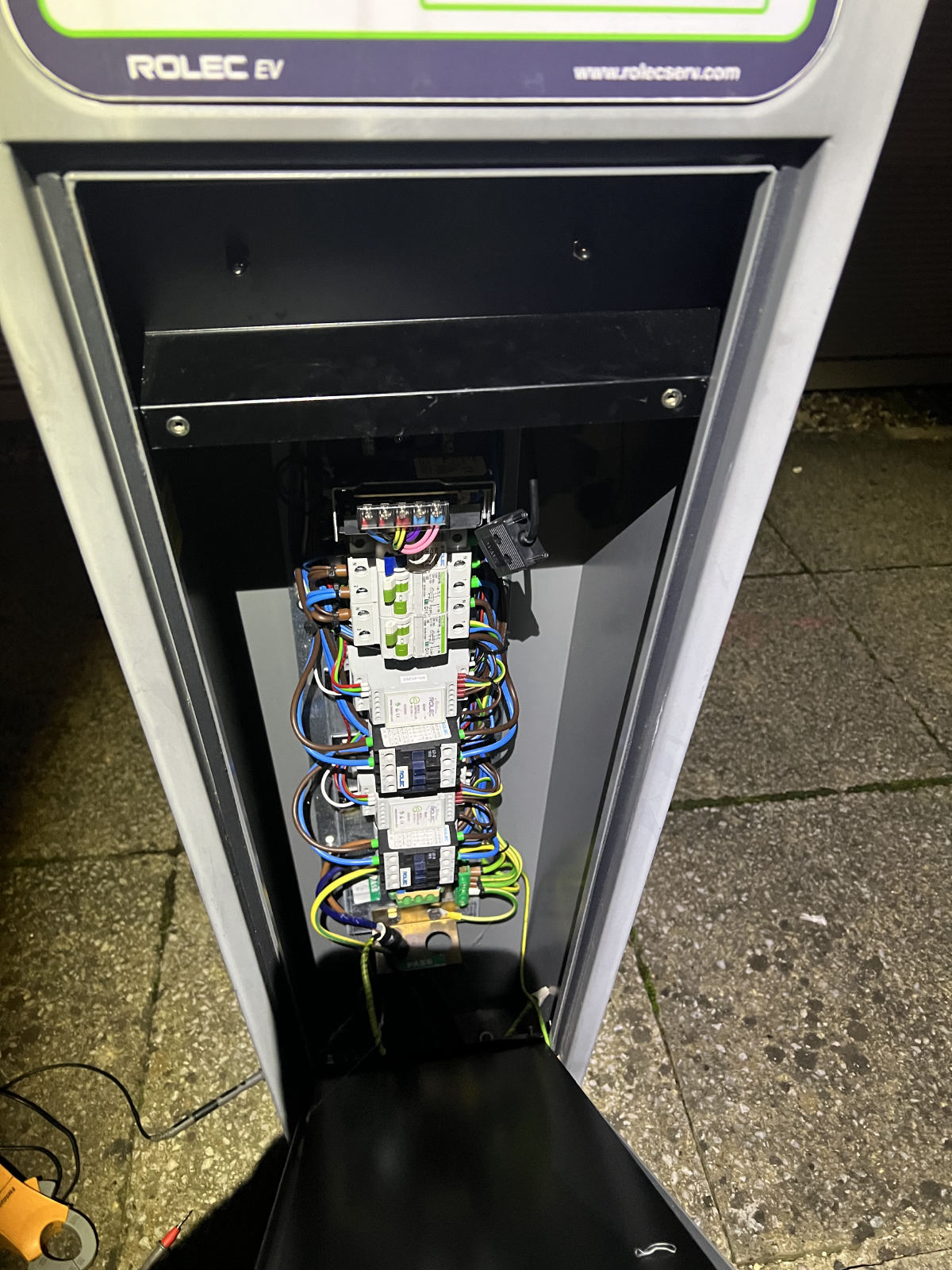 EV charge point opened on site, showing the protective devices on the DIN rail